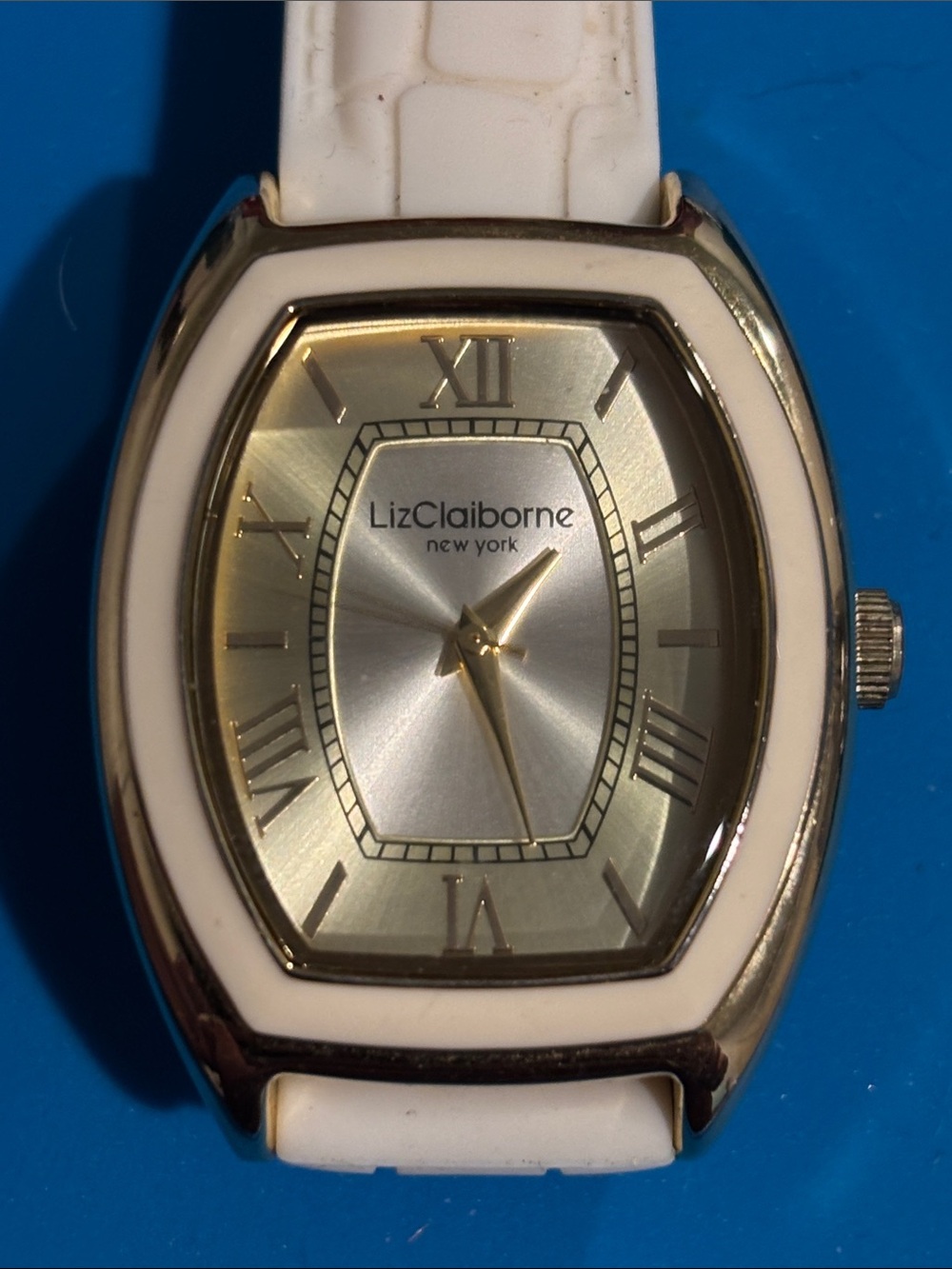 Liz Claiborne Gold Tone Dial with White Strap Watch